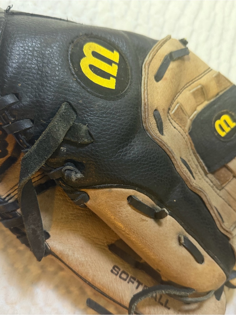 Wilsons Leather Black and Tan Softball Glove with Yellow Logo